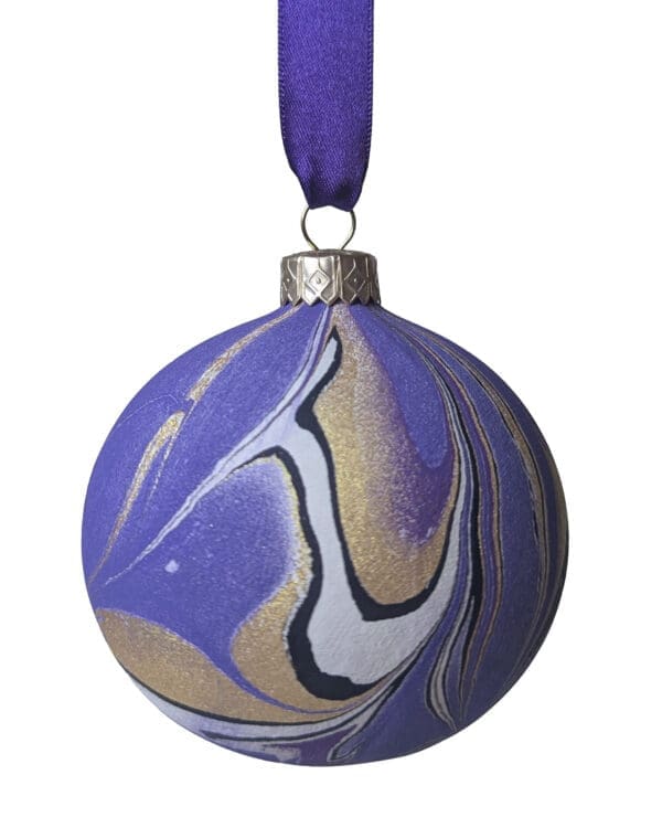 Luxury handmade marbled ceramic Christmas bauble decoration in purple and gold with purple satin ribbon