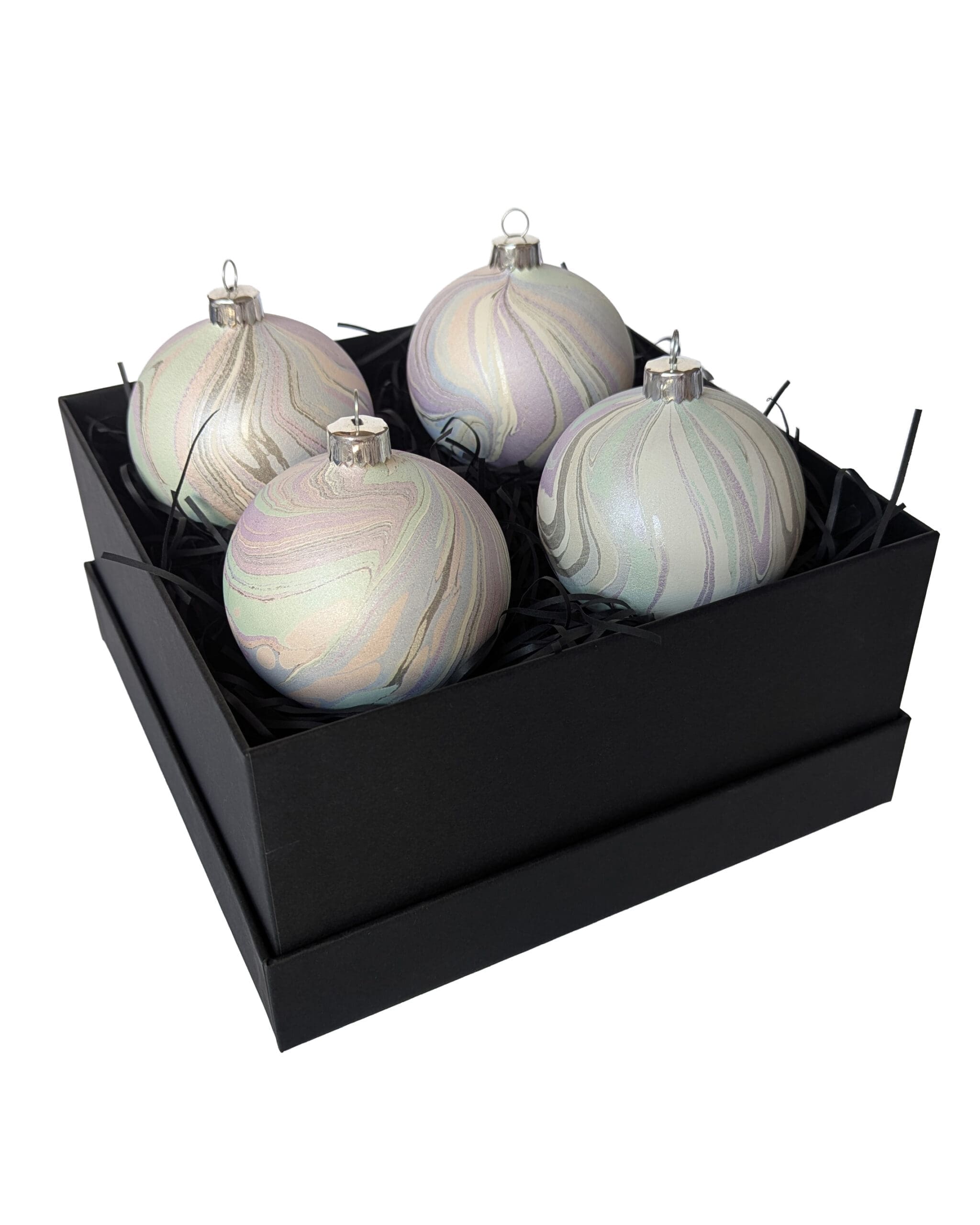 Set of 4 marbled Christmas baubles in pearlescent pastel colours in a black gift box