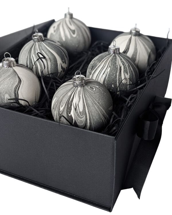 Set of 6 monochrome marbled Christmas baubles in a black gift box