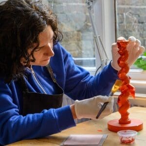 Handcrafting gilded candlesticks