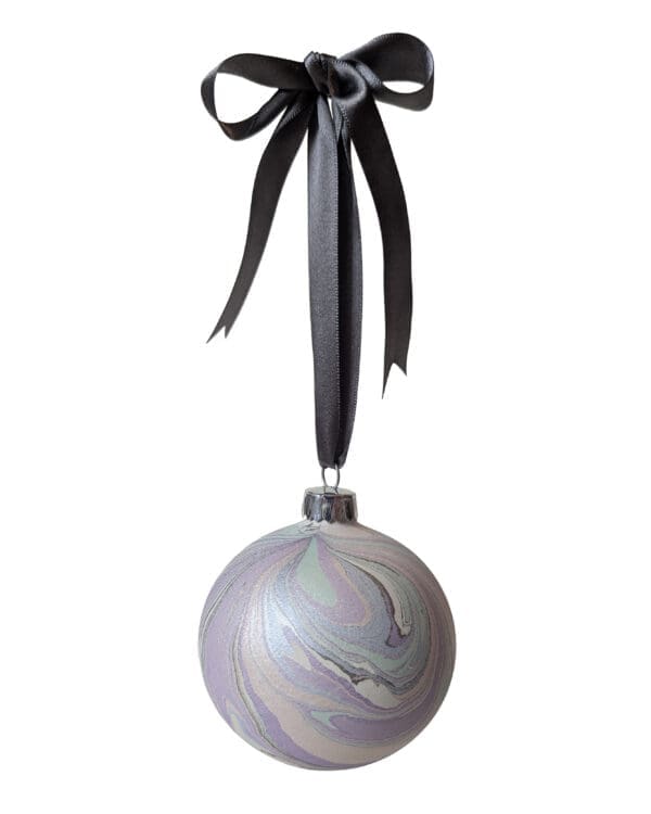 Hand crafted marbled Christmas bauble in pearlescent pastel colours on satin ribbon bow