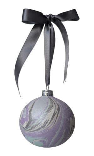 Winter Pearl hand marbled Christmas bauble in pearlescent colours hung with grey satin bow