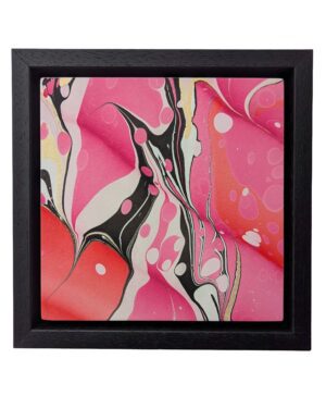 cutout image of red & pink marbled artwork set in black float frame