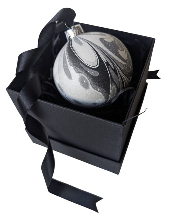 Black, white and silver marbled ceramic bauble in black gift box