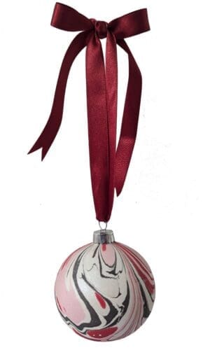 luxury Marbled Christmas bauble in red, pink, black and pearlescent white with red bow ribbon