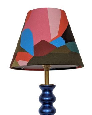 Small lampshade made from colourful geometric fabric